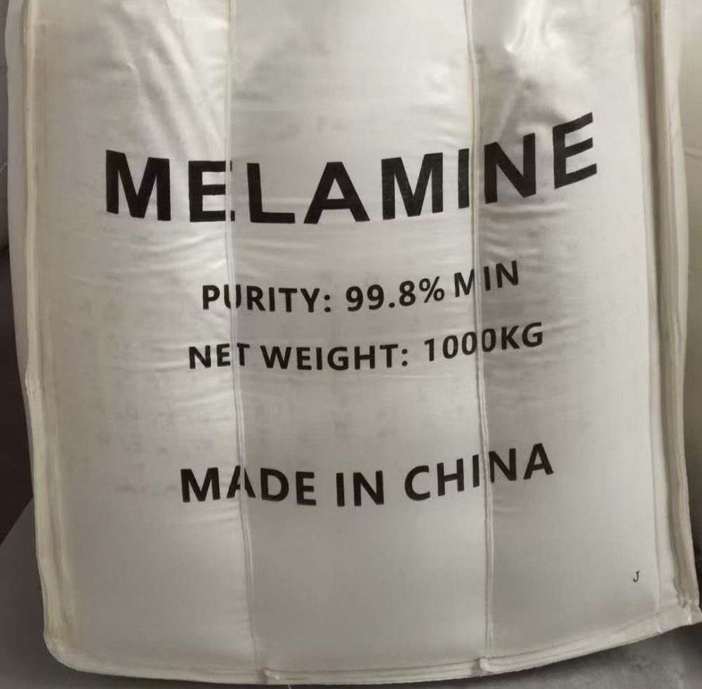Melamine supplied in 1000 kg jumbo bags, marked MELAMINE NET WEIGHT 1000 KG